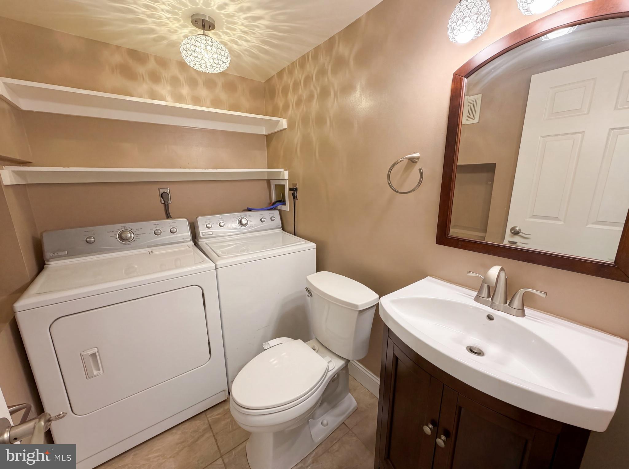 724 13th Street Northeast Washington, DC 20002 - Photo 15 of 20 Chic laundry-bathroom combo oasis.