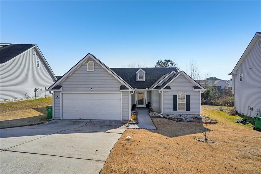 4496 Jackam Ridge Court Lithonia, GA 30038 - Photo 2 of 24 a view of a house with a sink and yard