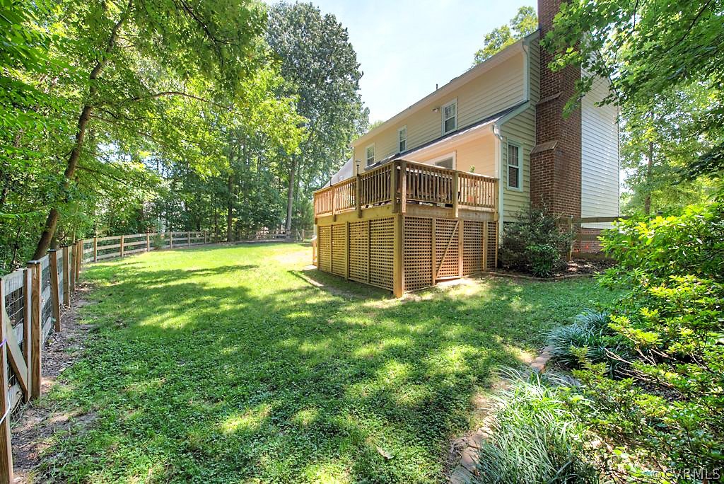 13908 Shadow Ridge Lane Midlothian, VA 23112 - Photo 34 of 35 a view of a backyard with a garden