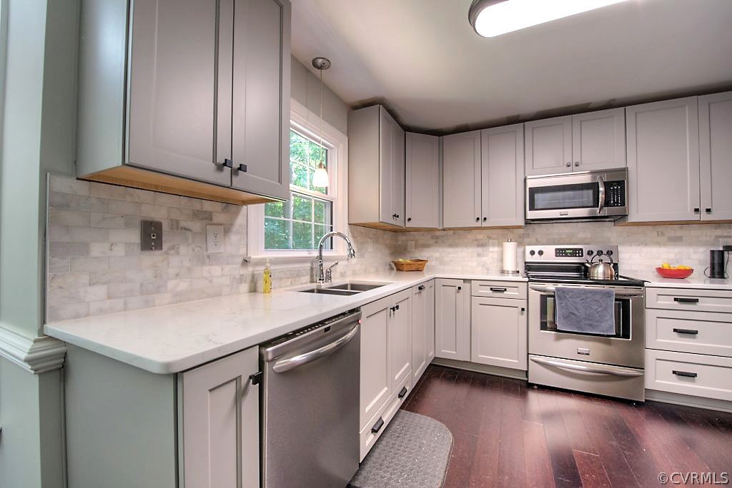 13908 Shadow Ridge Lane Midlothian, VA 23112 - Photo 6 of 35 a kitchen with granite countertop a sink stainless steel appliances and cabinets