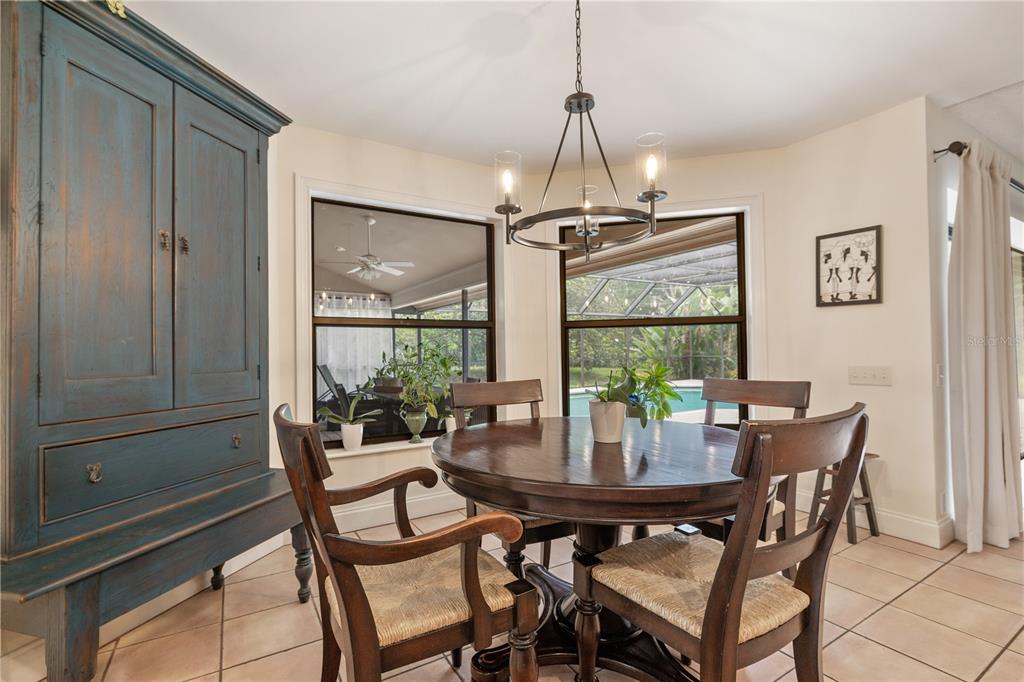 3372 Brian Road South Palm Harbor, FL 34685 - Photo 10 of 45 a view of a dining room with furniture window and outside view