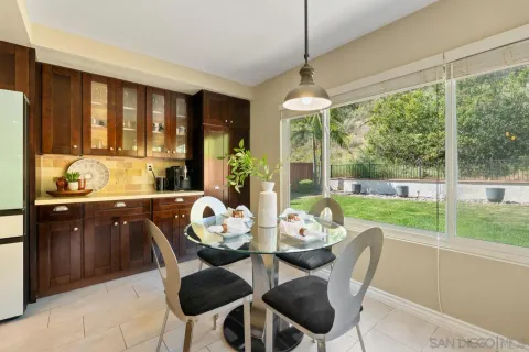 a kitchen with a sink a counter space and a window