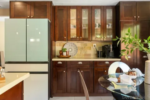 a kitchen with a stove and a microwave