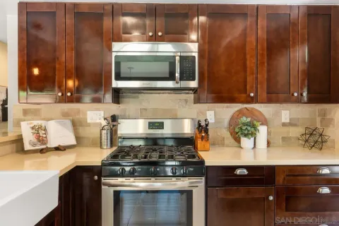 a bathroom with a sink vanity and mirror