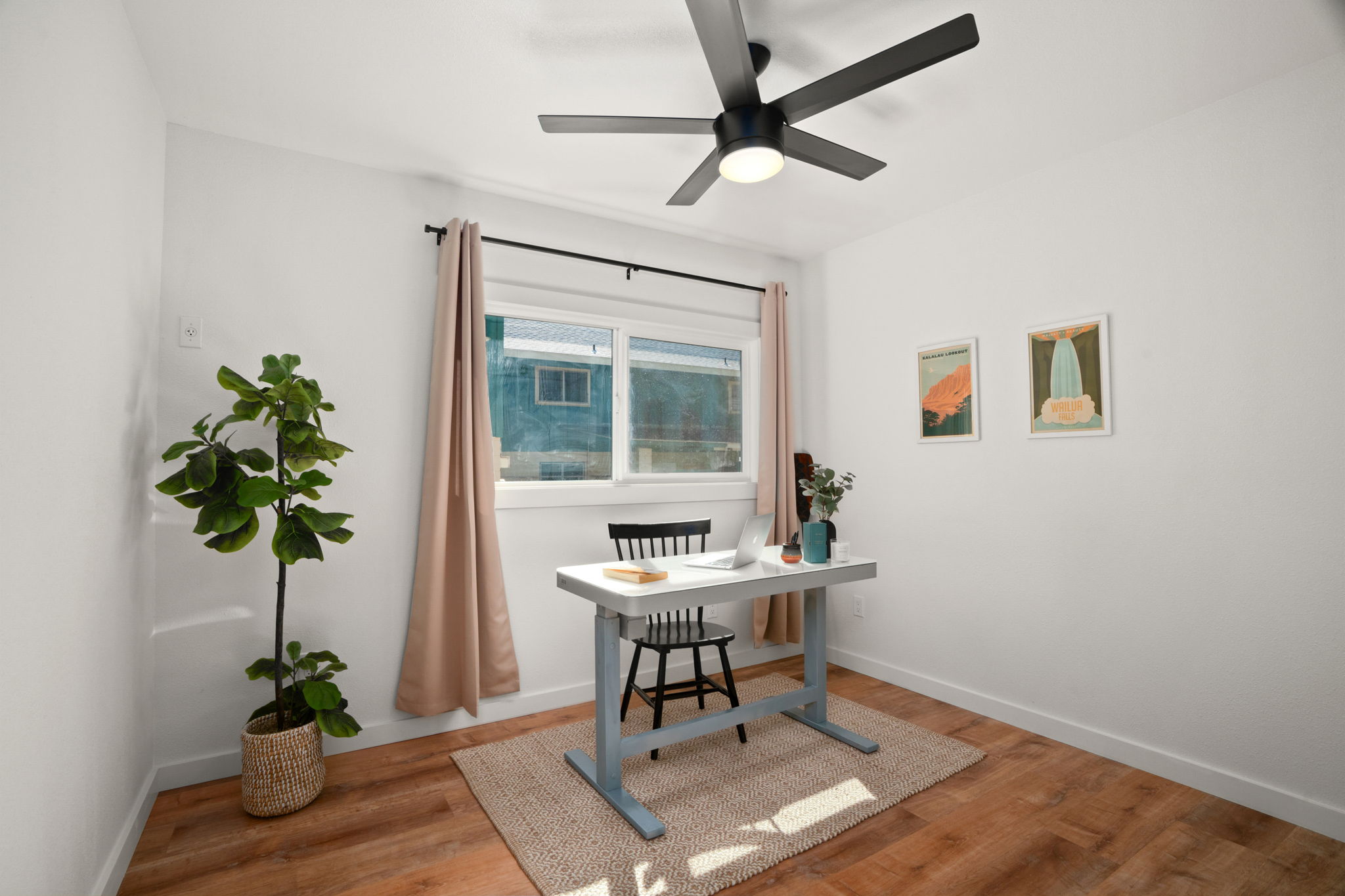 8556 Elepaio Road, Unit B Kekaha, HI 96752 - Photo 20 of 24 a workspace with furniture and a potted plant