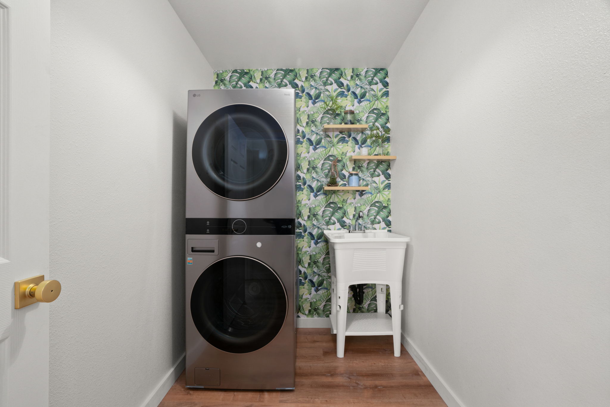 8556 Elepaio Road, Unit B Kekaha, HI 96752 - Photo 24 of 24 a view of a hallway with washer and dryer