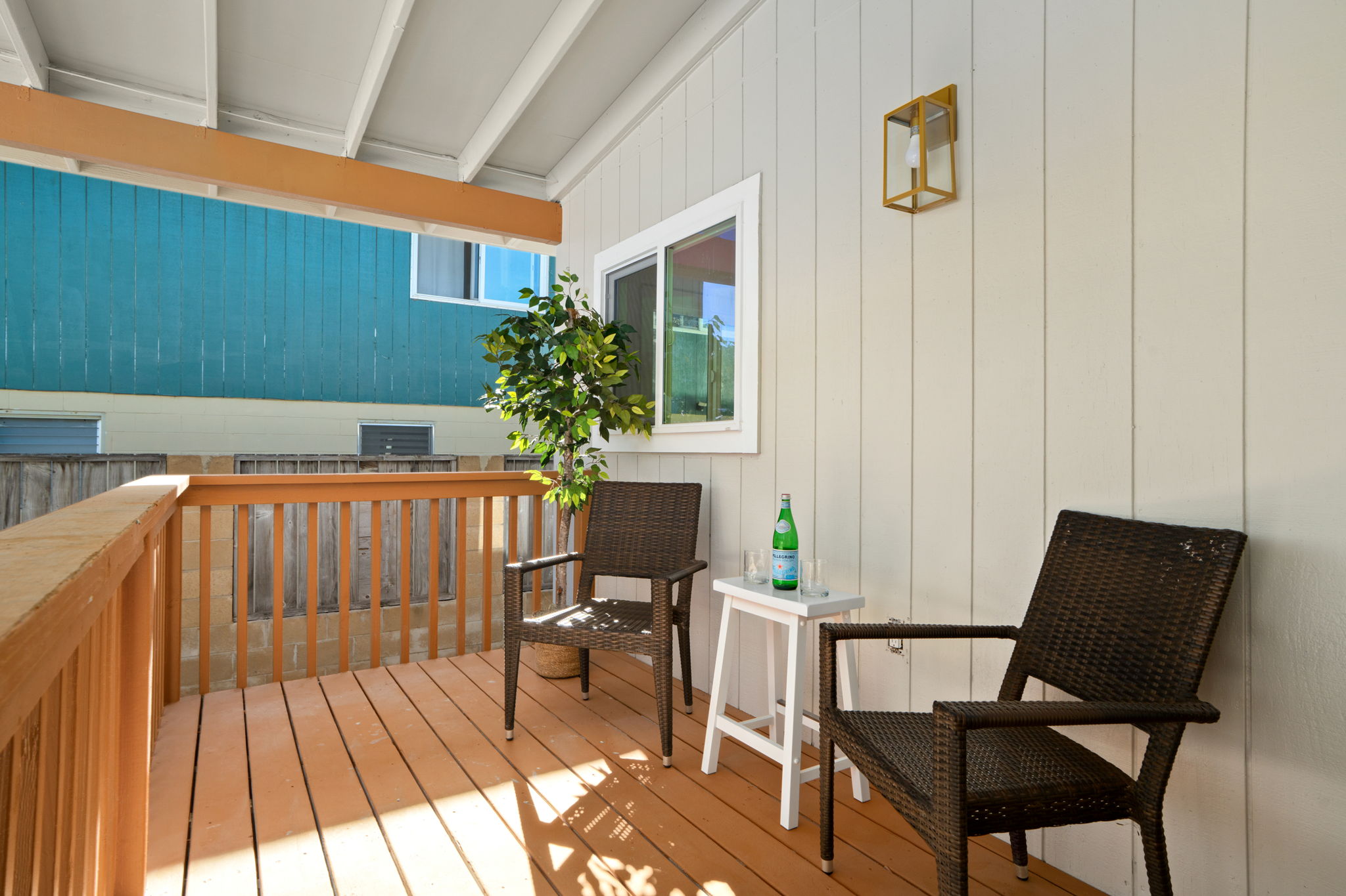 8556 Elepaio Road, Unit B Kekaha, HI 96752 - Photo 4 of 24 a view of a two chairs in the balcony