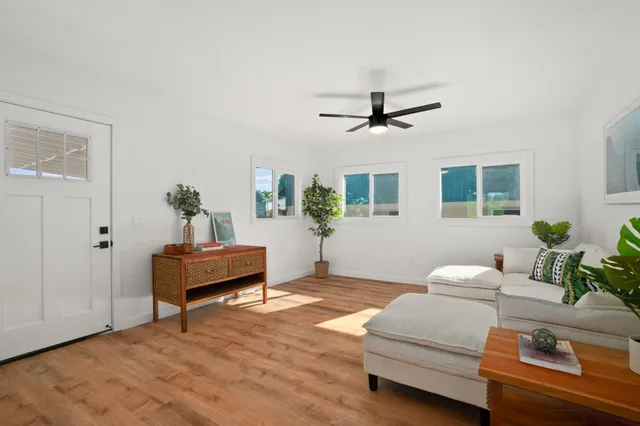 a living room with furniture and window