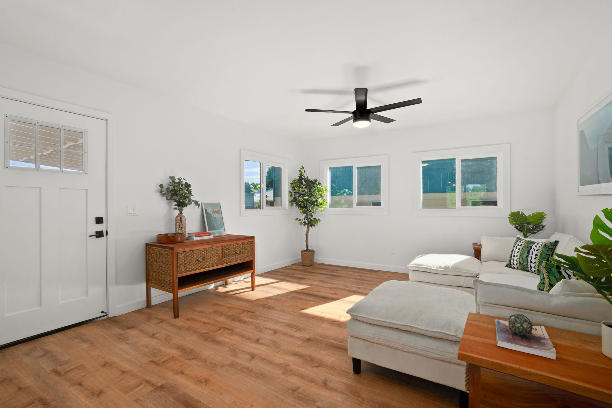 8556 Elepaio Road, Unit B Kekaha, HI 96752 - Photo 5 of 24 a living room with furniture and window