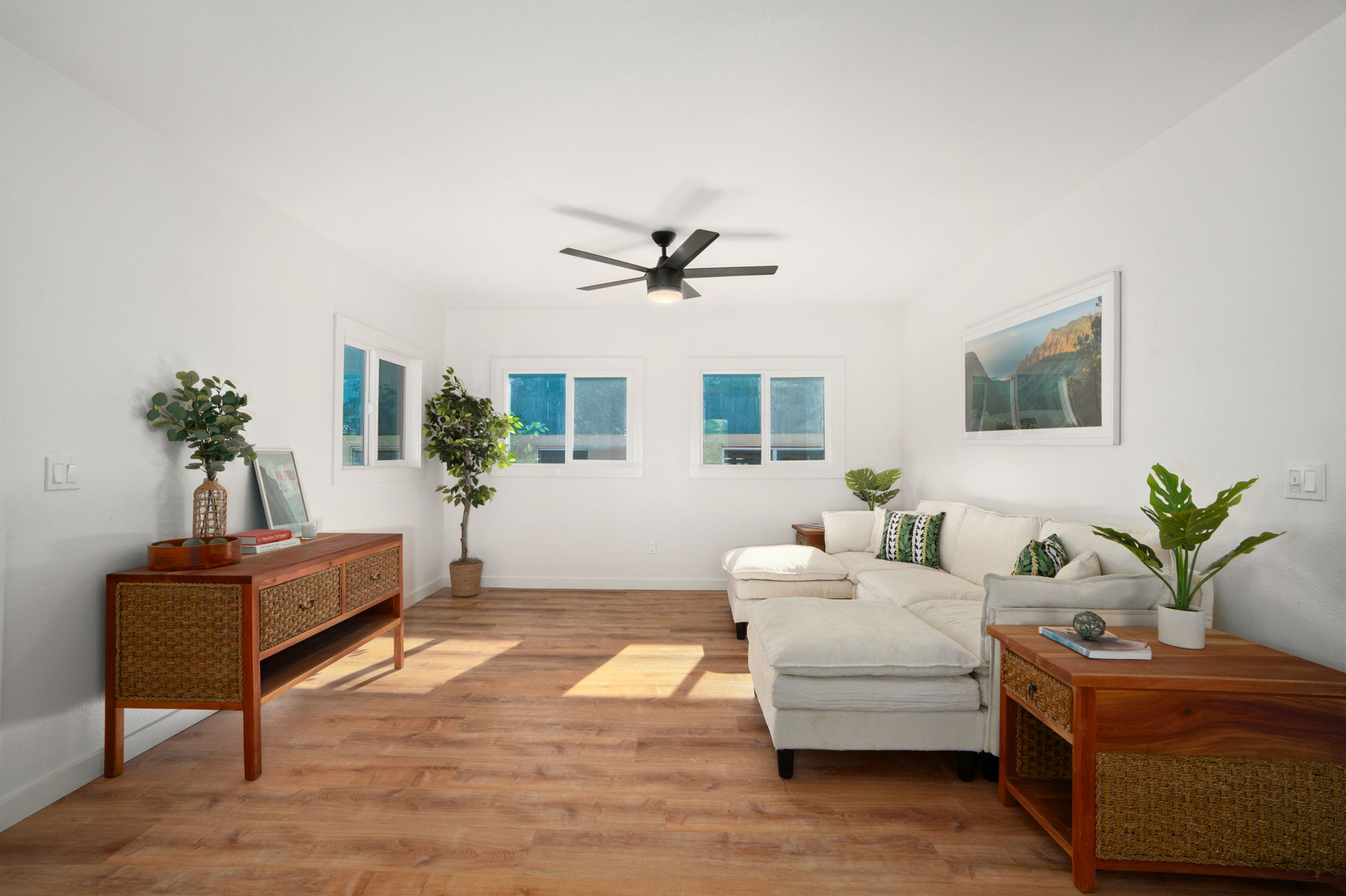 8556 Elepaio Road, Unit B Kekaha, HI 96752 - Photo 6 of 24 a living room with furniture and a potted plant