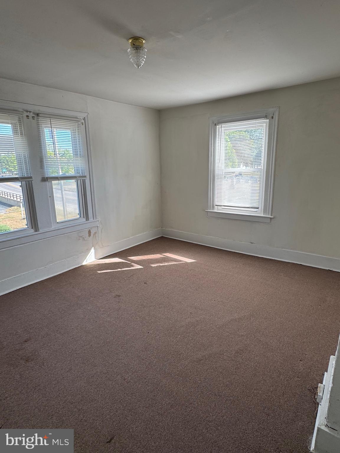 24876 Meeting House Road Denton, MD 21629 - Photo 5 of 15 an empty room with a window