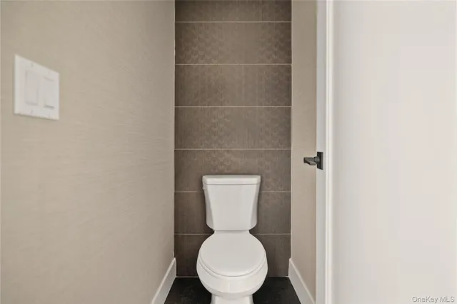 a view of a hallway with a white walls