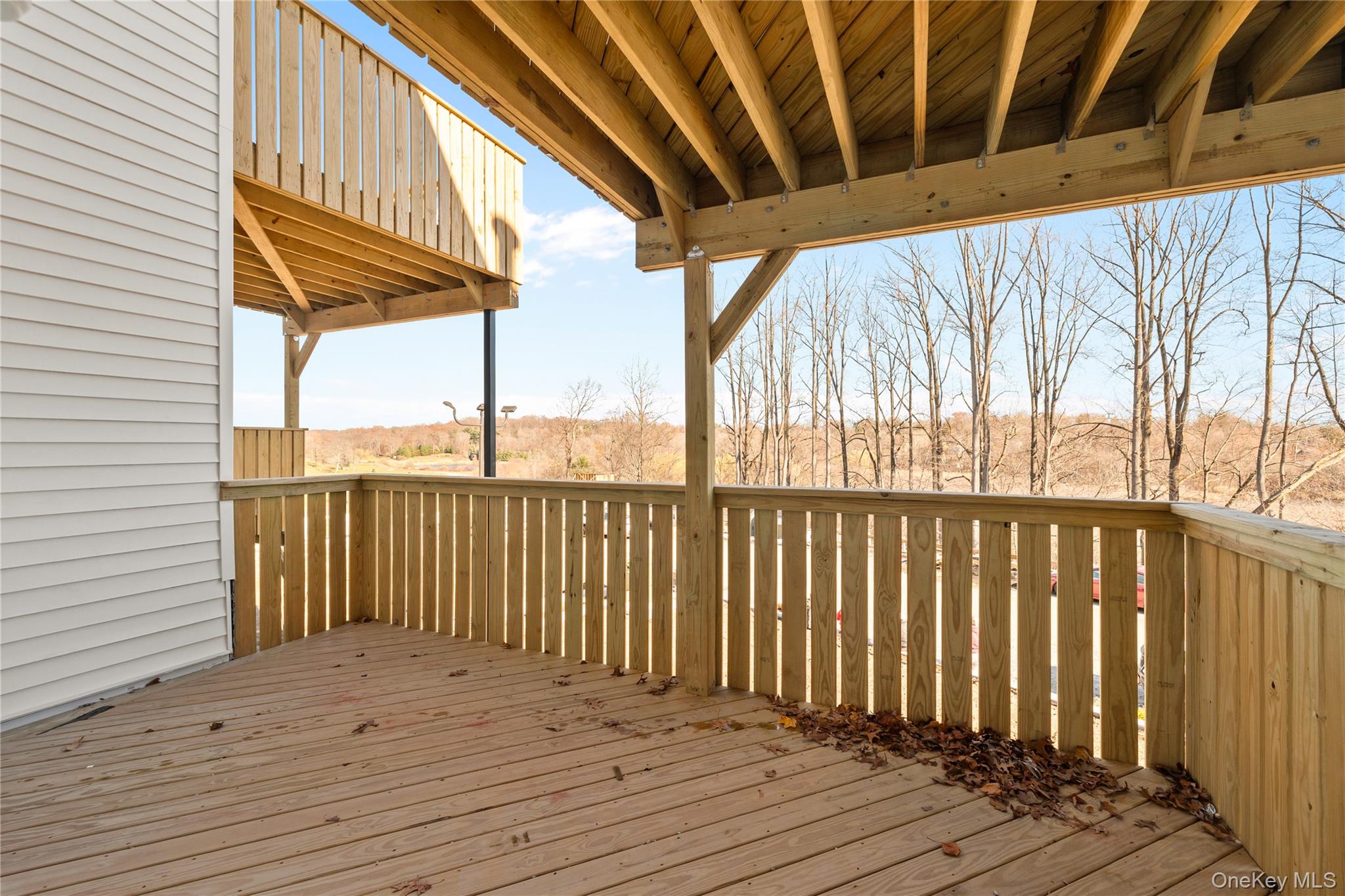 5 Valley Way, Unit 320 Spring Valley, NY 10977 - Photo 32 of 41 a view of a balcony with wooden floor