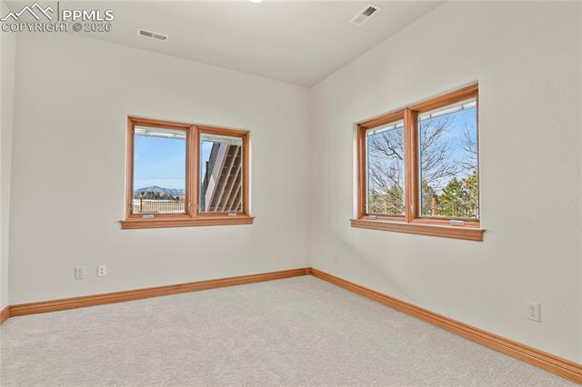 5220 Roundup Ridge Road Colorado Springs, CO 80908 - Photo 47 of 50 Sitting room off secondary suite