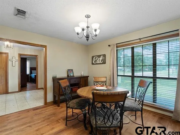 a kitchen with granite countertop stainless steel appliances and sink