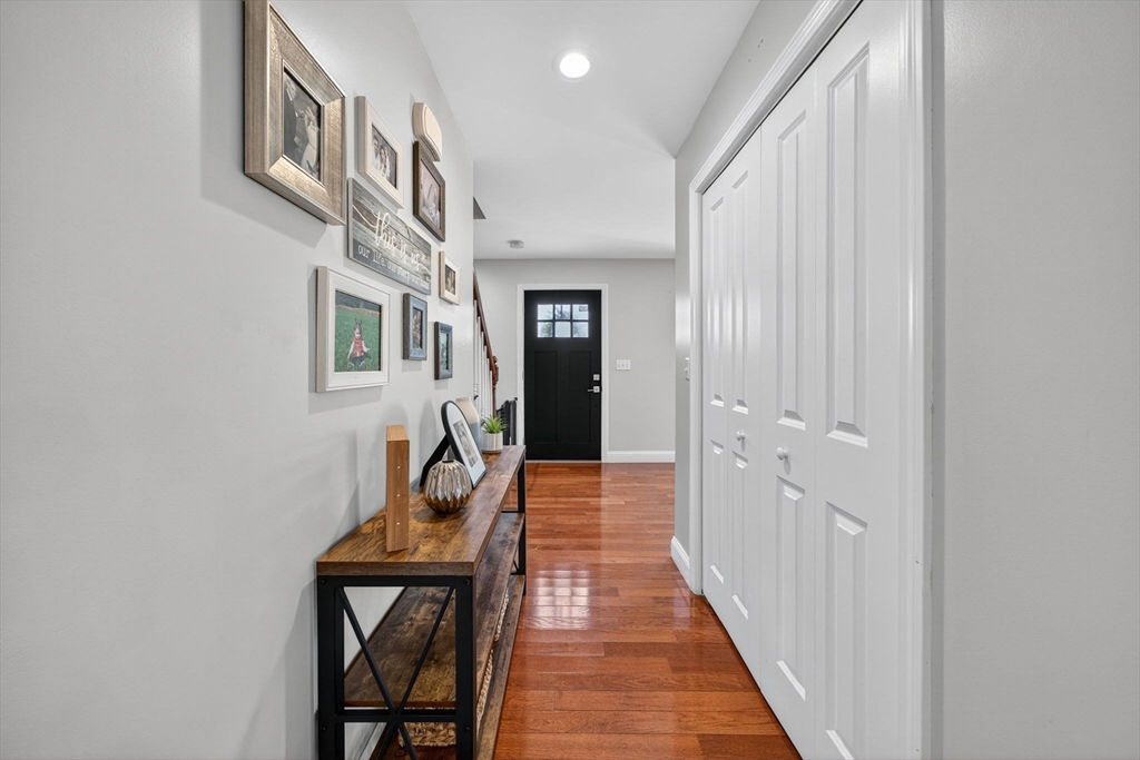 750 Cambridge Street Fall River, MA 02721 - Photo 15 of 38 a hallway with wooden floor windows