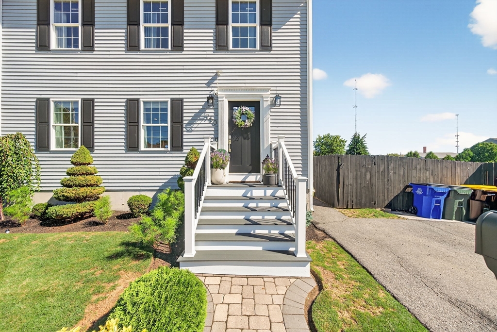 750 Cambridge Street Fall River, MA 02721 - Photo 2 of 38 a view of a house with backyard and sitting area