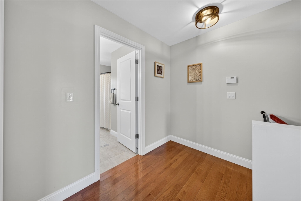 750 Cambridge Street Fall River, MA 02721 - Photo 22 of 38 a view of empty room with wooden floor