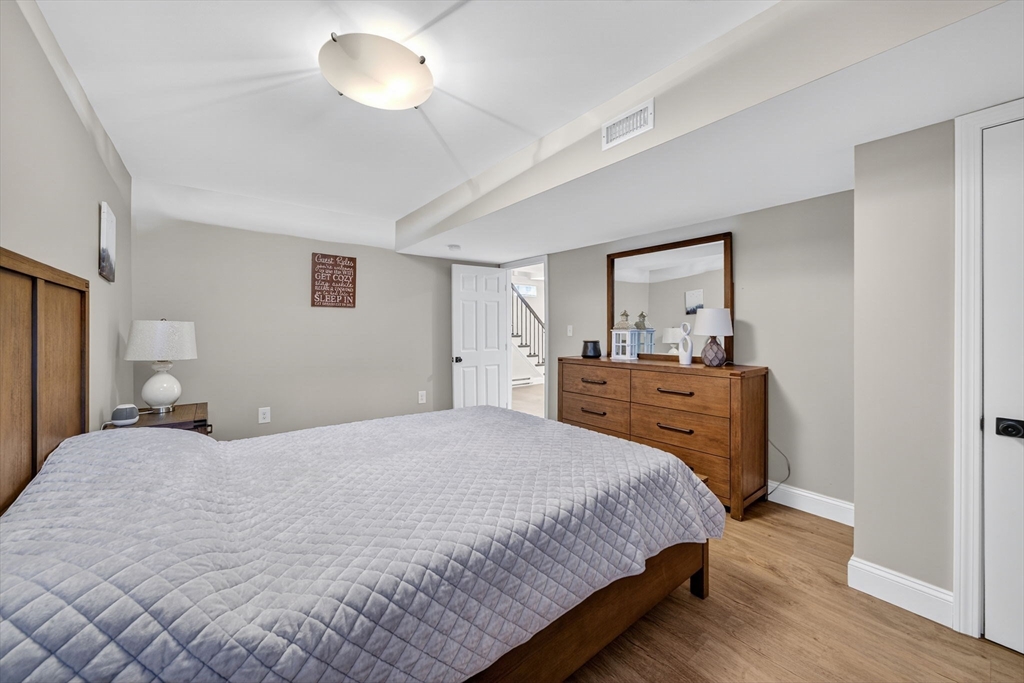 750 Cambridge Street Fall River, MA 02721 - Photo 29 of 38 a bedroom with a bed and a closet