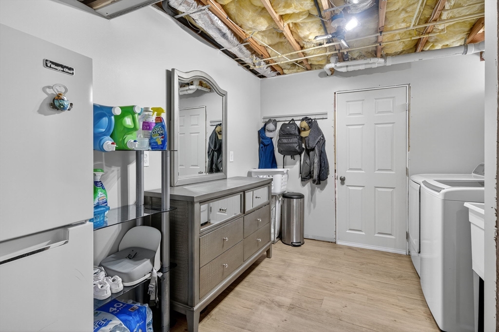 750 Cambridge Street Fall River, MA 02721 - Photo 31 of 38 a view of walk in closet with clothes and shoes