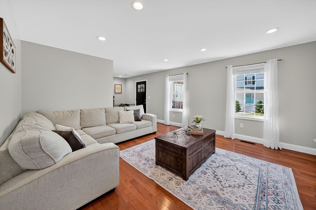 750 Cambridge Street Fall River, MA 02721 - Photo 6 of 38 a living room with furniture and a rug
