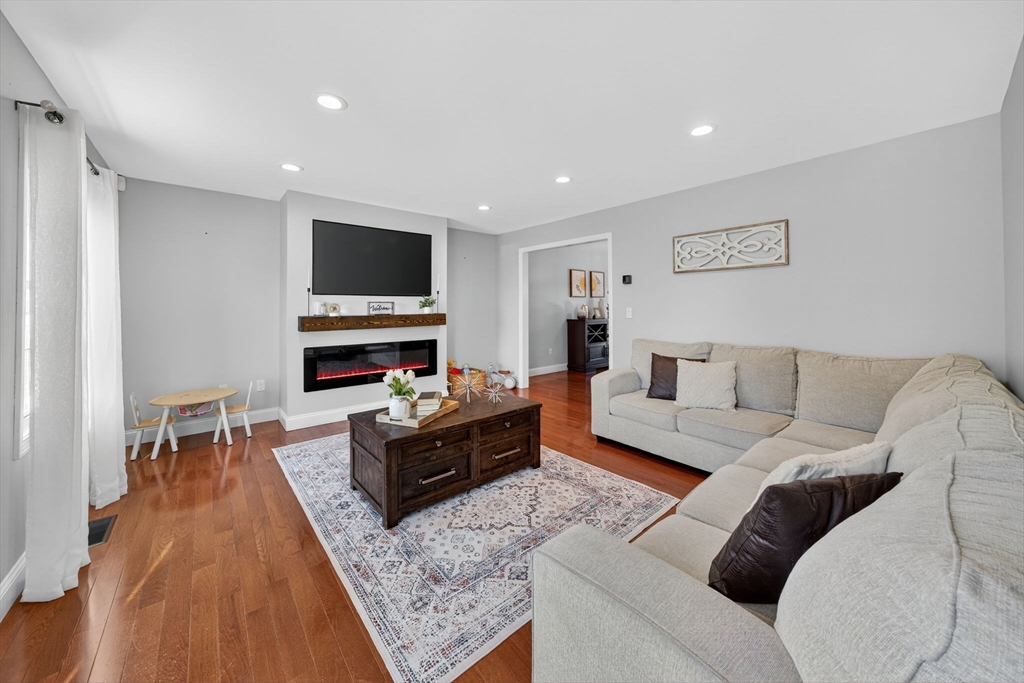 750 Cambridge Street Fall River, MA 02721 - Photo 7 of 38 a living room with furniture and a flat screen tv