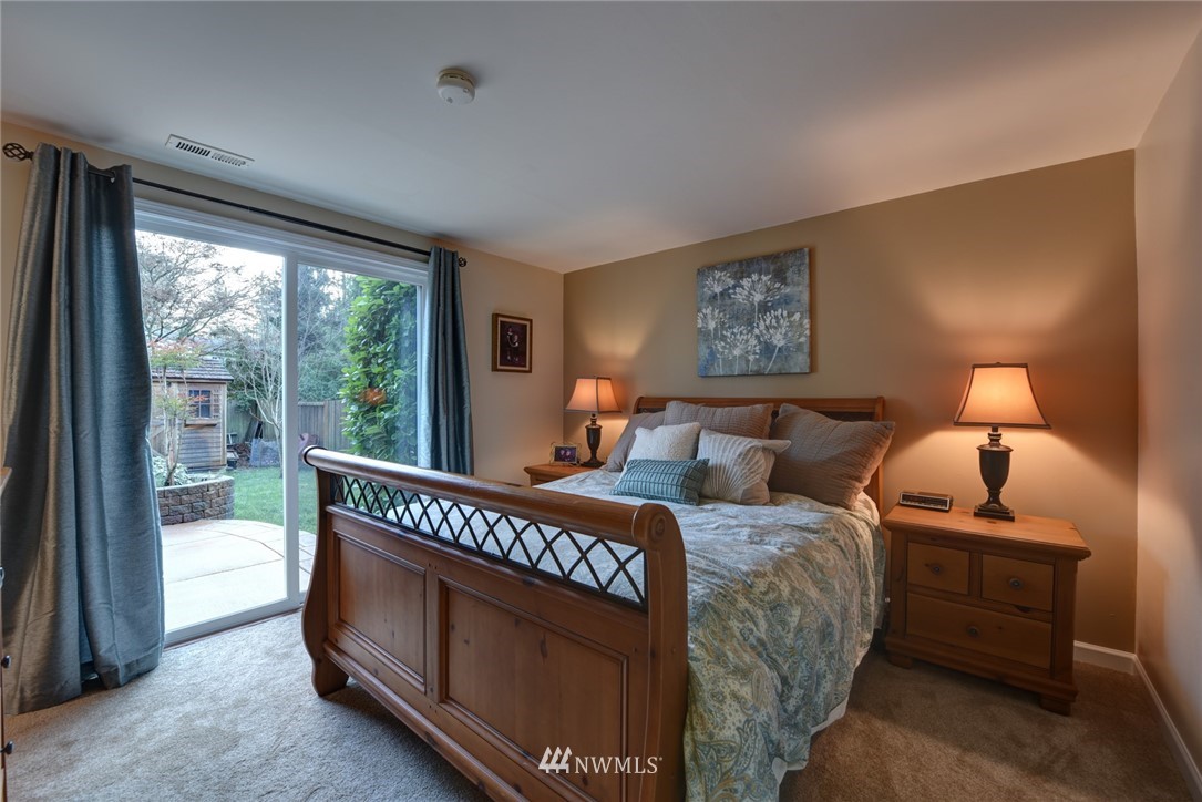 2206 168th Street Southeast Bothell, WA 98012 - Photo 15 of 21 a bed room with a bed and a window