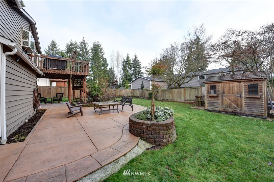 2206 168th Street Southeast Bothell, WA 98012 - Photo 18 of 21 a view of a backyard with sitting area