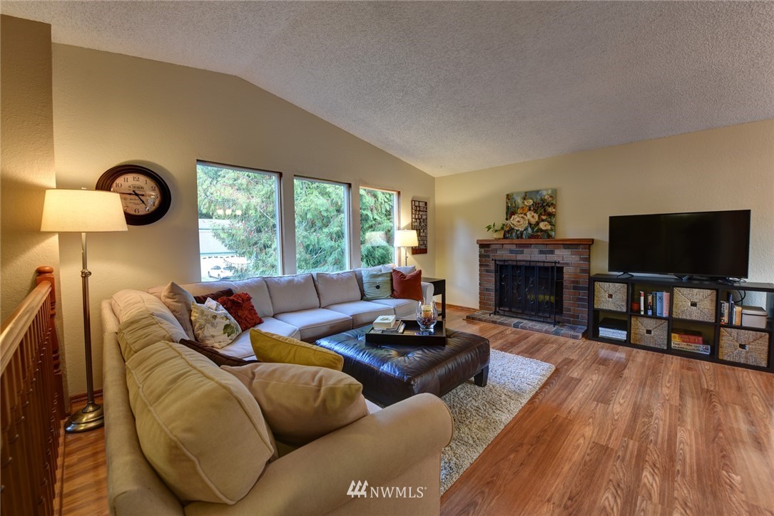 2206 168th Street Southeast Bothell, WA 98012 - Photo 5 of 21 a living room with furniture and a flat screen tv