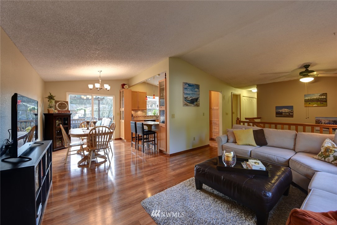 2206 168th Street Southeast Bothell, WA 98012 - Photo 8 of 21 a living room with furniture and a flat screen tv