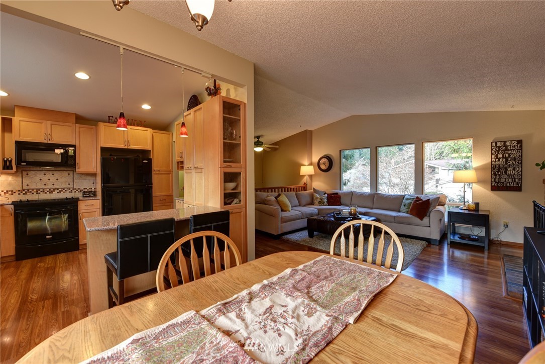 2206 168th Street Southeast Bothell, WA 98012 - Photo 9 of 21 a living room with furniture and a flat screen tv