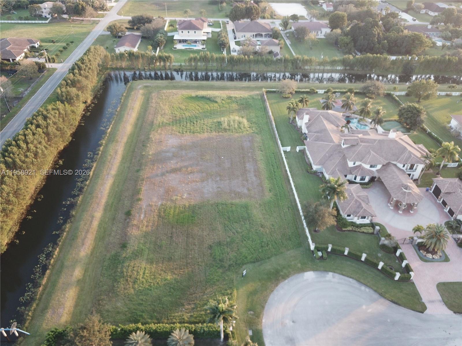 16700 Berkshire Court Southwest Ranches, FL 33331 - Photo 4 of 11 a view of a swimming pool from a balcony
