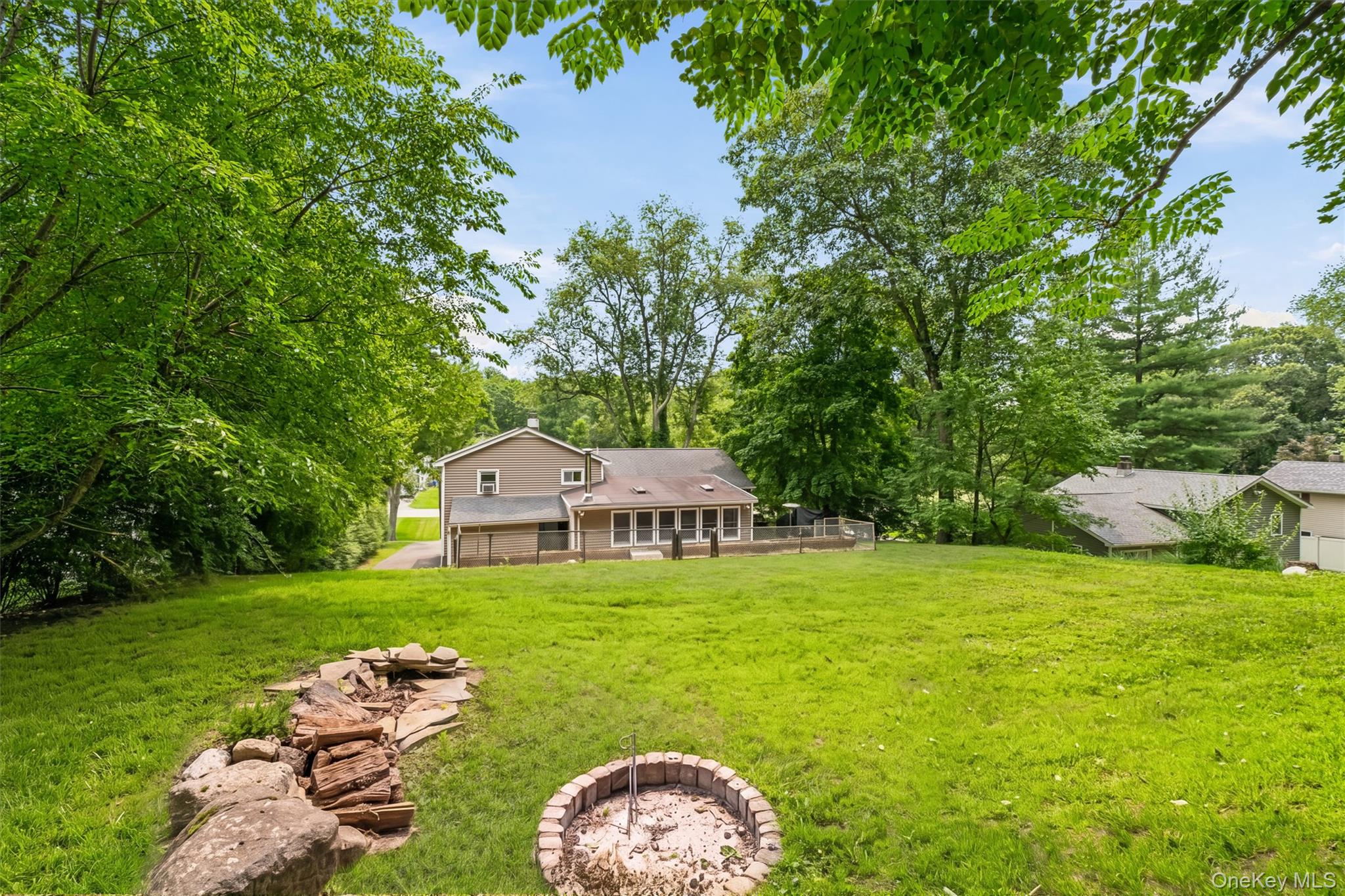 17 Ridge Road Cortlandt Manor, NY 10567 - Photo 33 of 38 Enjoy the firepit and peaceful & private yard.