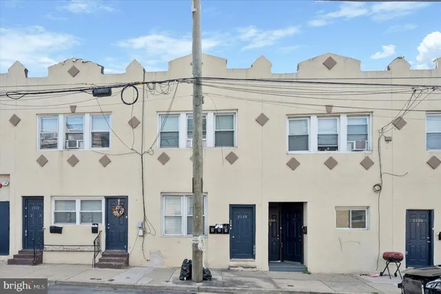 a view of a building with a street