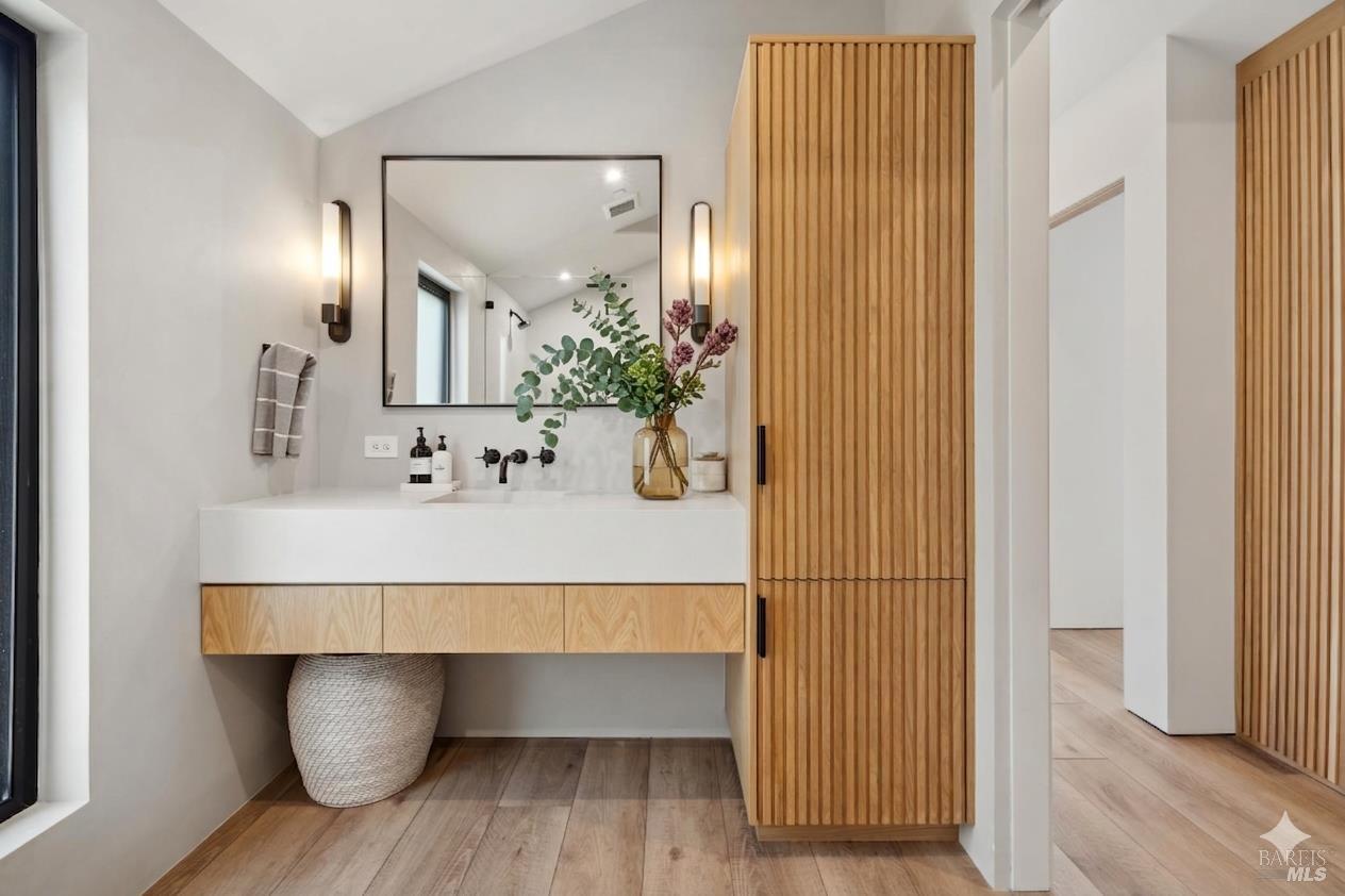 297 Seadrift Road Stinson Beach, CA 94970 - Photo 35 of 68 a bathroom with a sink and mirror