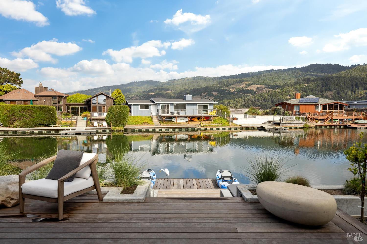 297 Seadrift Road Stinson Beach, CA 94970 - Photo 51 of 68 a view of a lake with a mountain view