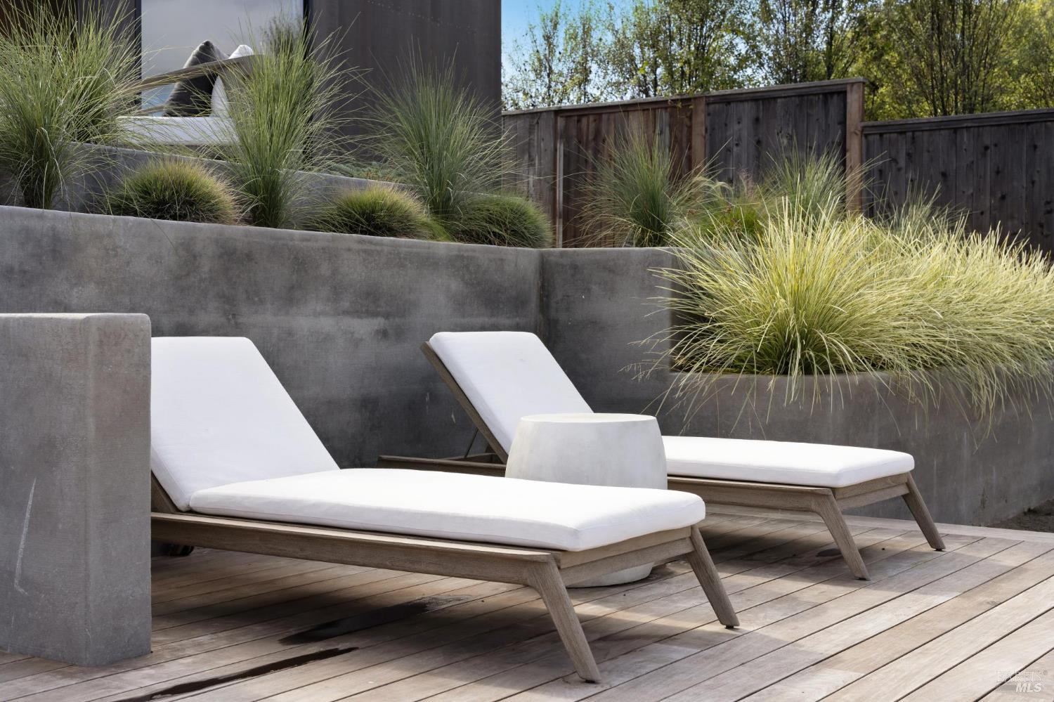297 Seadrift Road Stinson Beach, CA 94970 - Photo 10 of 68 a view of backyard with seating space and trees in the background