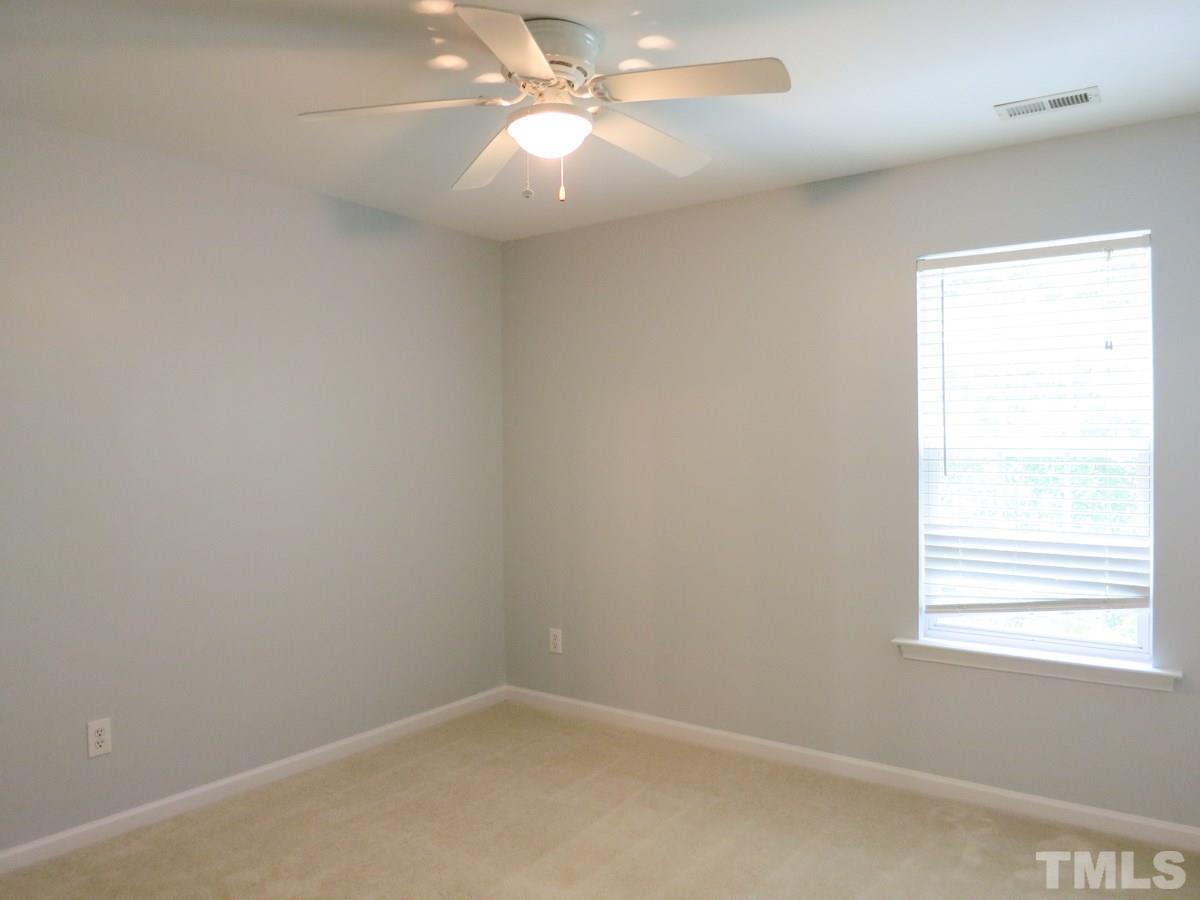 8516 Barryknoll Court Raleigh, NC 27613 - Photo 16 of 25 There are 2 add’l spacious Bedrooms w/neutral carpet, CF & lg closets. This is Bedroom 2 which has a WIC.