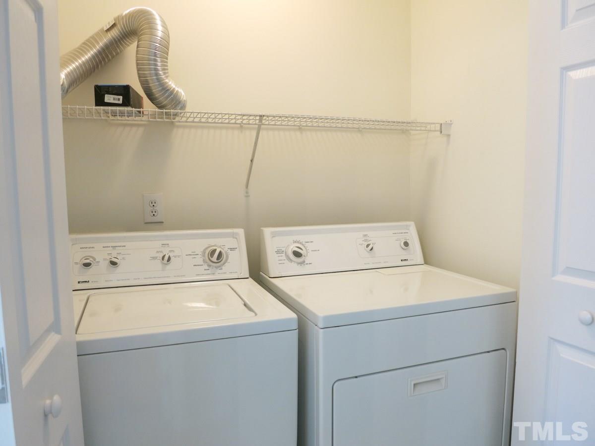 8516 Barryknoll Court Raleigh, NC 27613 - Photo 19 of 25 The convenient Laundry closet is located in the upstairs hallway near the Bedrooms.