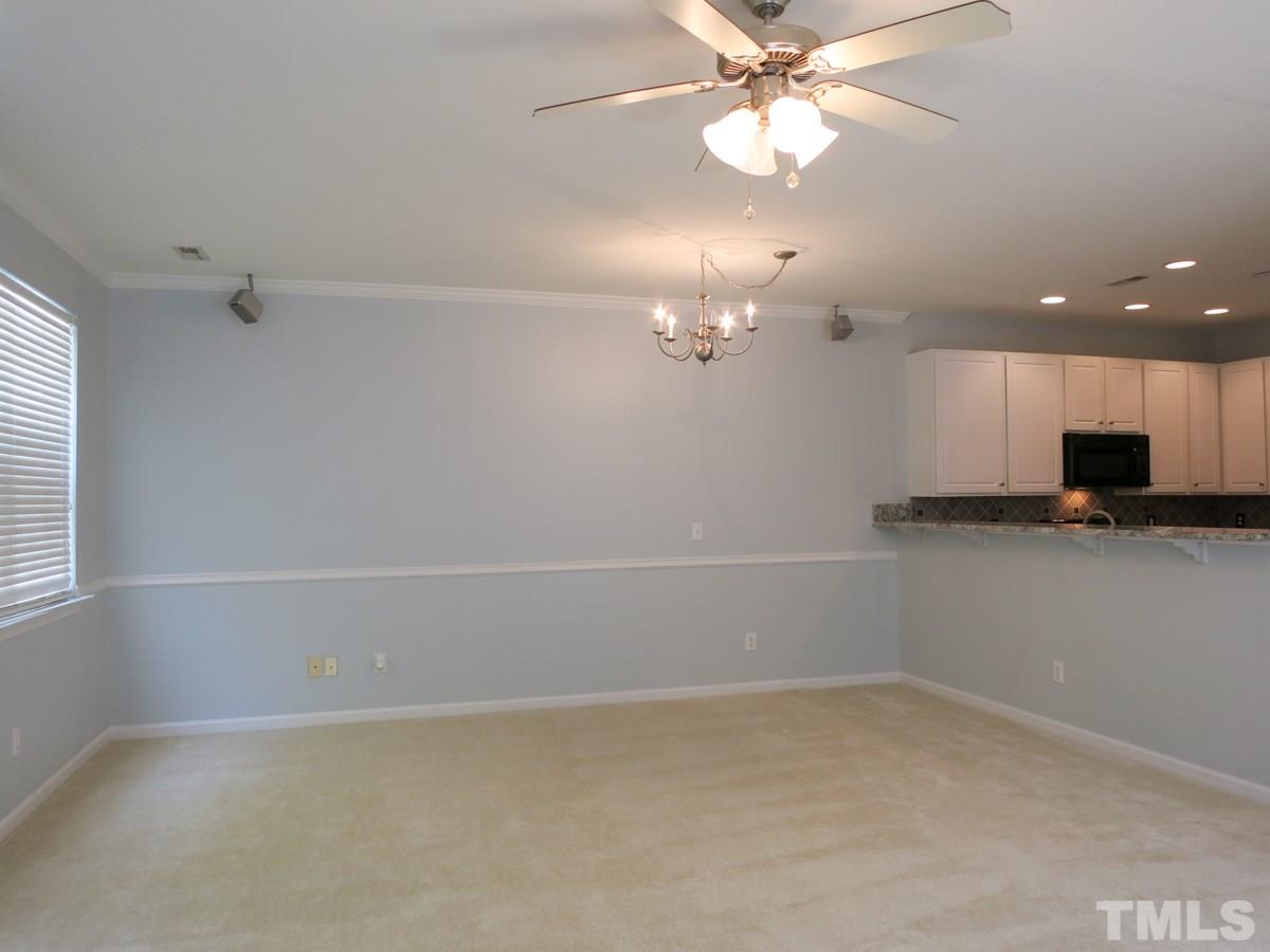 8516 Barryknoll Court Raleigh, NC 27613 - Photo 6 of 25 The spacious Living Rm is open to the Dining area.