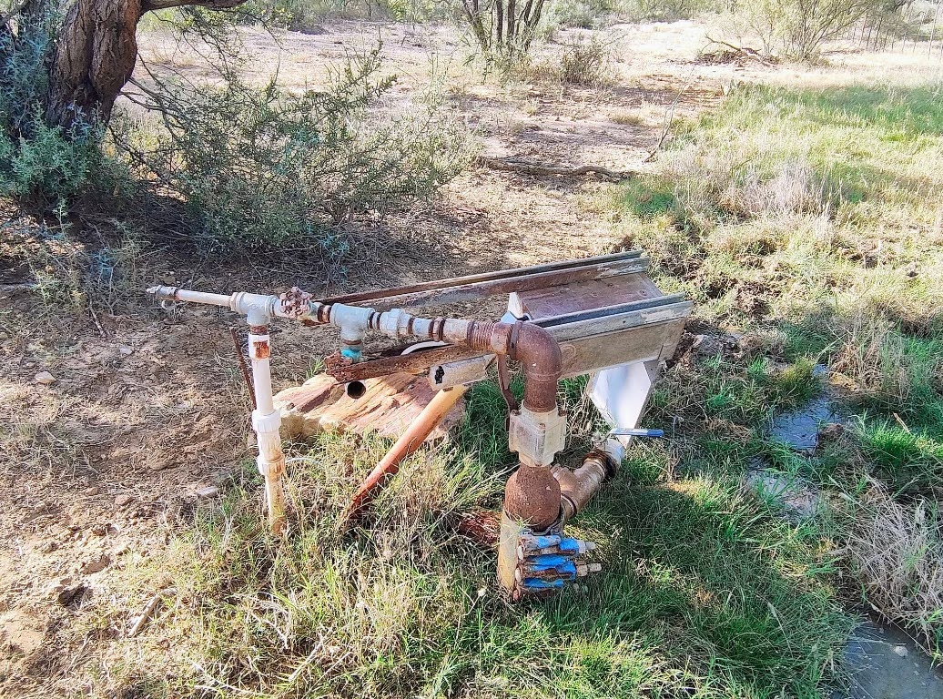 567 County Road 241 Rochelle, TX 76872 - Photo 8 of 22 a backyard of a house with table and chairs