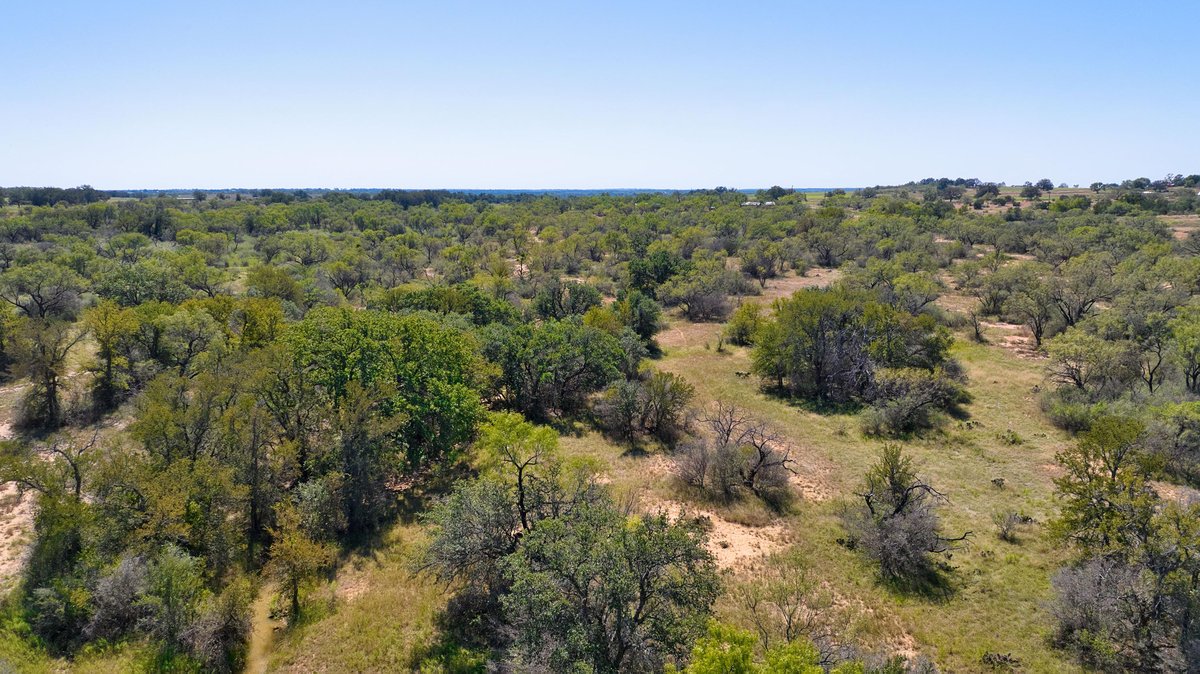 567 County Road 241 Rochelle, TX 76872 - Photo 10 of 22 an aerial view of residential houses with outdoor space and trees