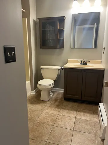a bathroom with a sink and a toilet