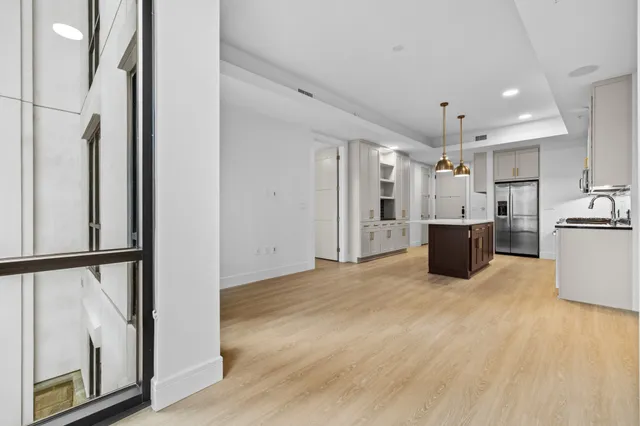 a view of front door with balcony