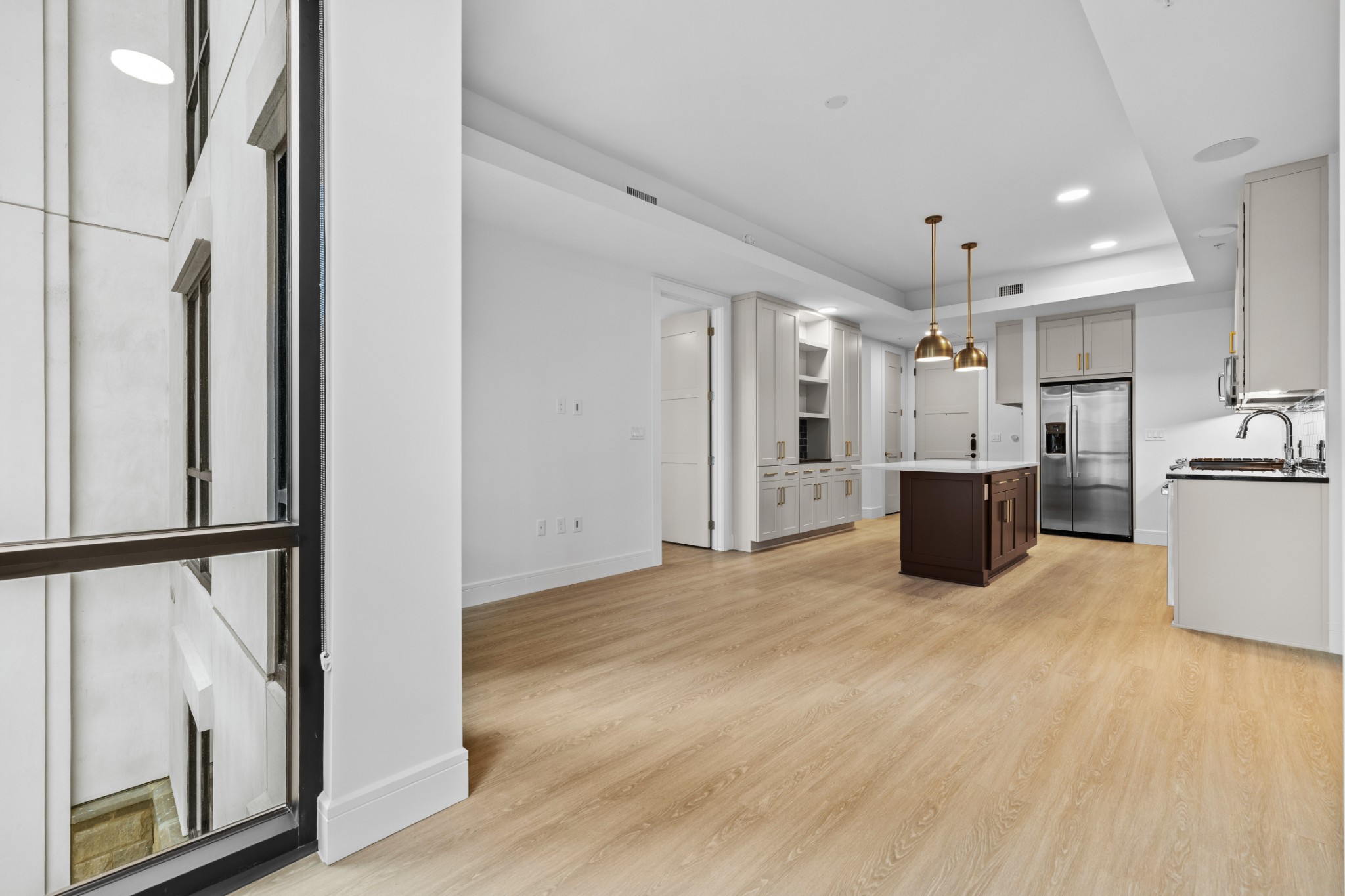 930 Commerce Street, Unit 508 Nashville, TN 37203 - Photo 16 of 65 a view of empty room with wooden floor