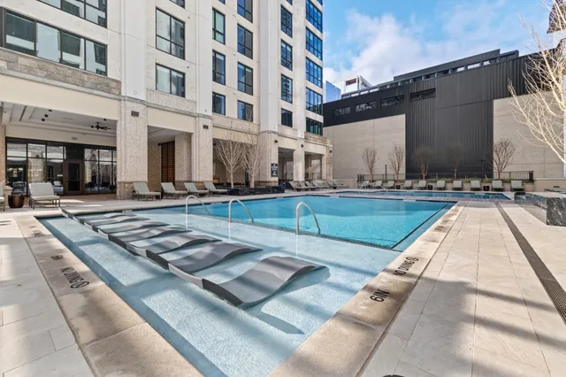 a view of a building with a swimming pool