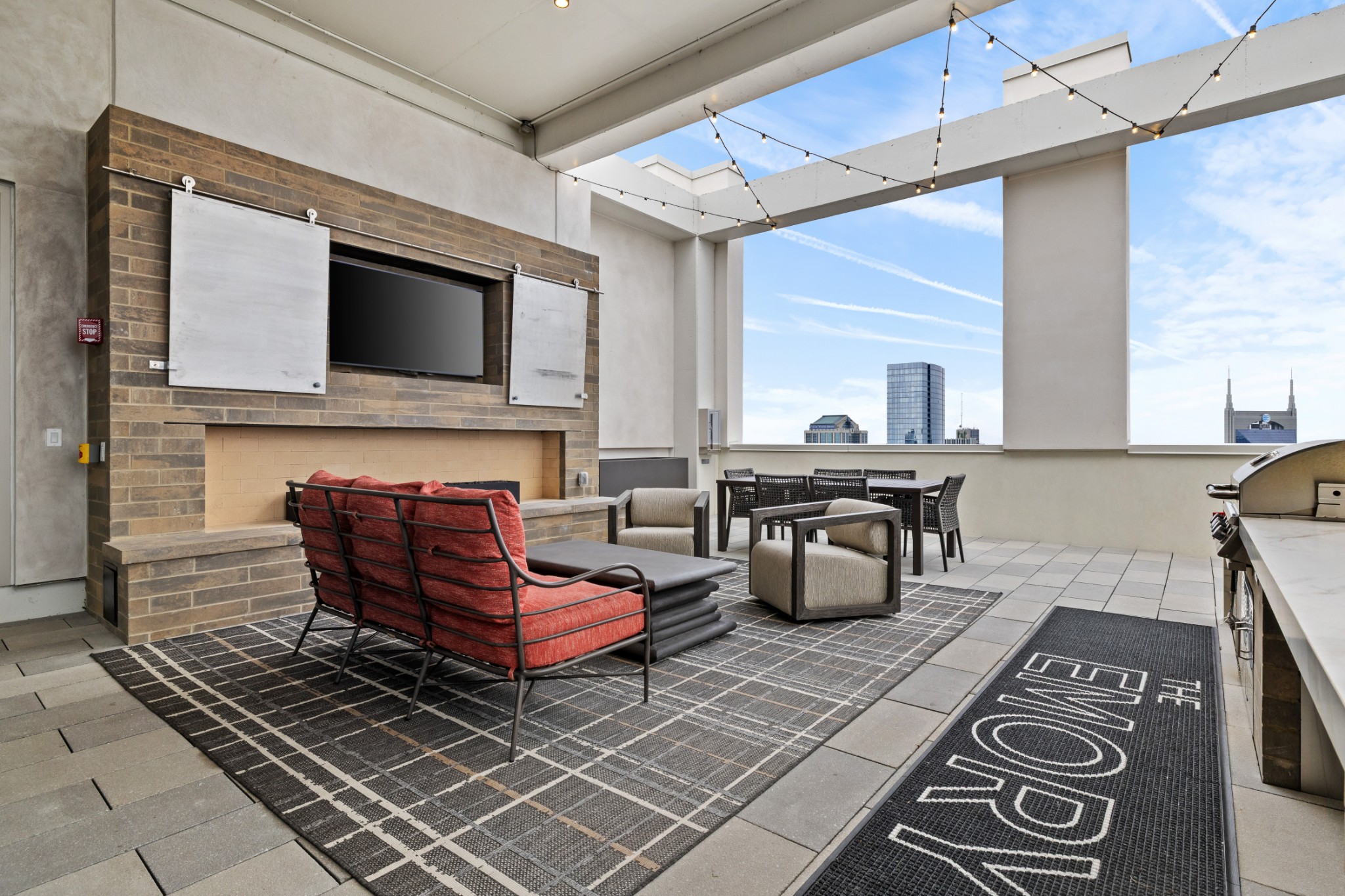 930 Commerce Street, Unit 508 Nashville, TN 37203 - Photo 31 of 65 a living room with furniture and a fireplace