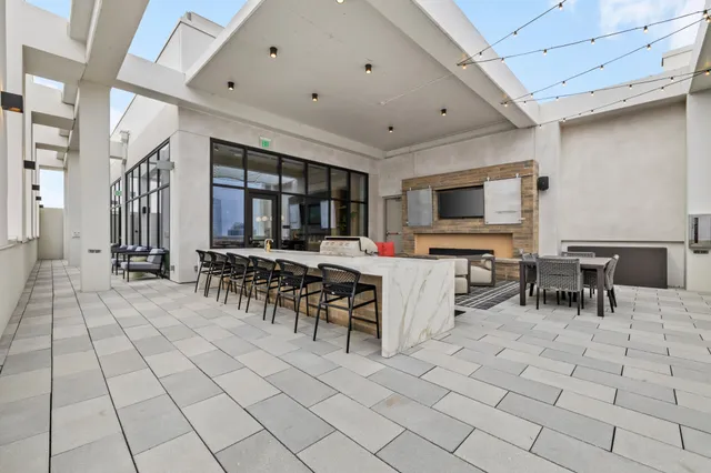 a view of a livingroom with furniture and a fireplace