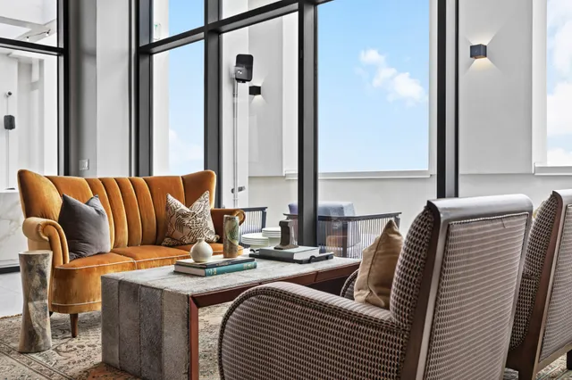 a living room with furniture and a couch