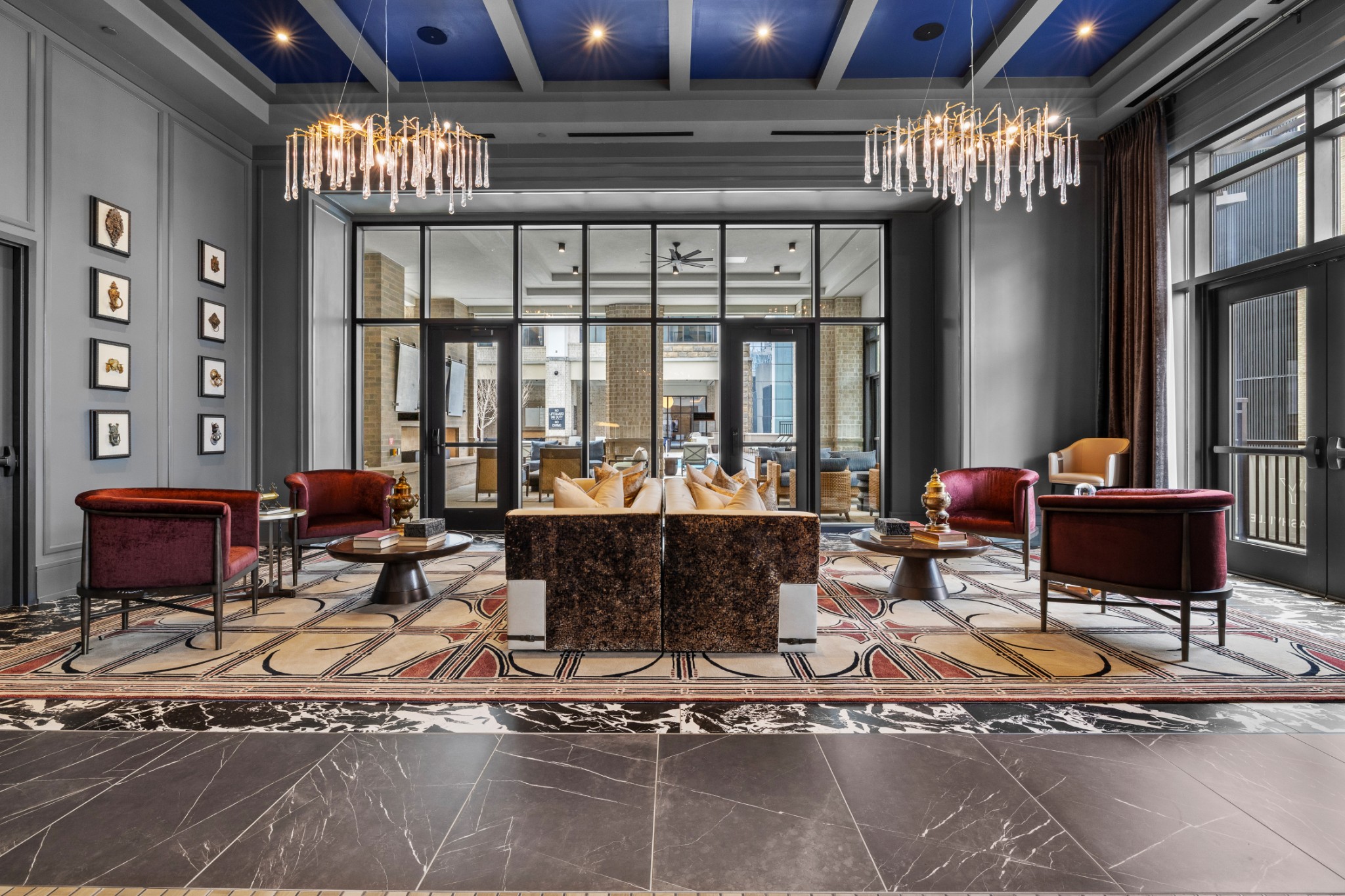 930 Commerce Street, Unit 508 Nashville, TN 37203 - Photo 44 of 65 a living room with dining table and a chandelier